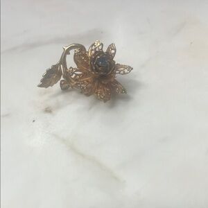 Gold Floral Brooch with Blue Accent